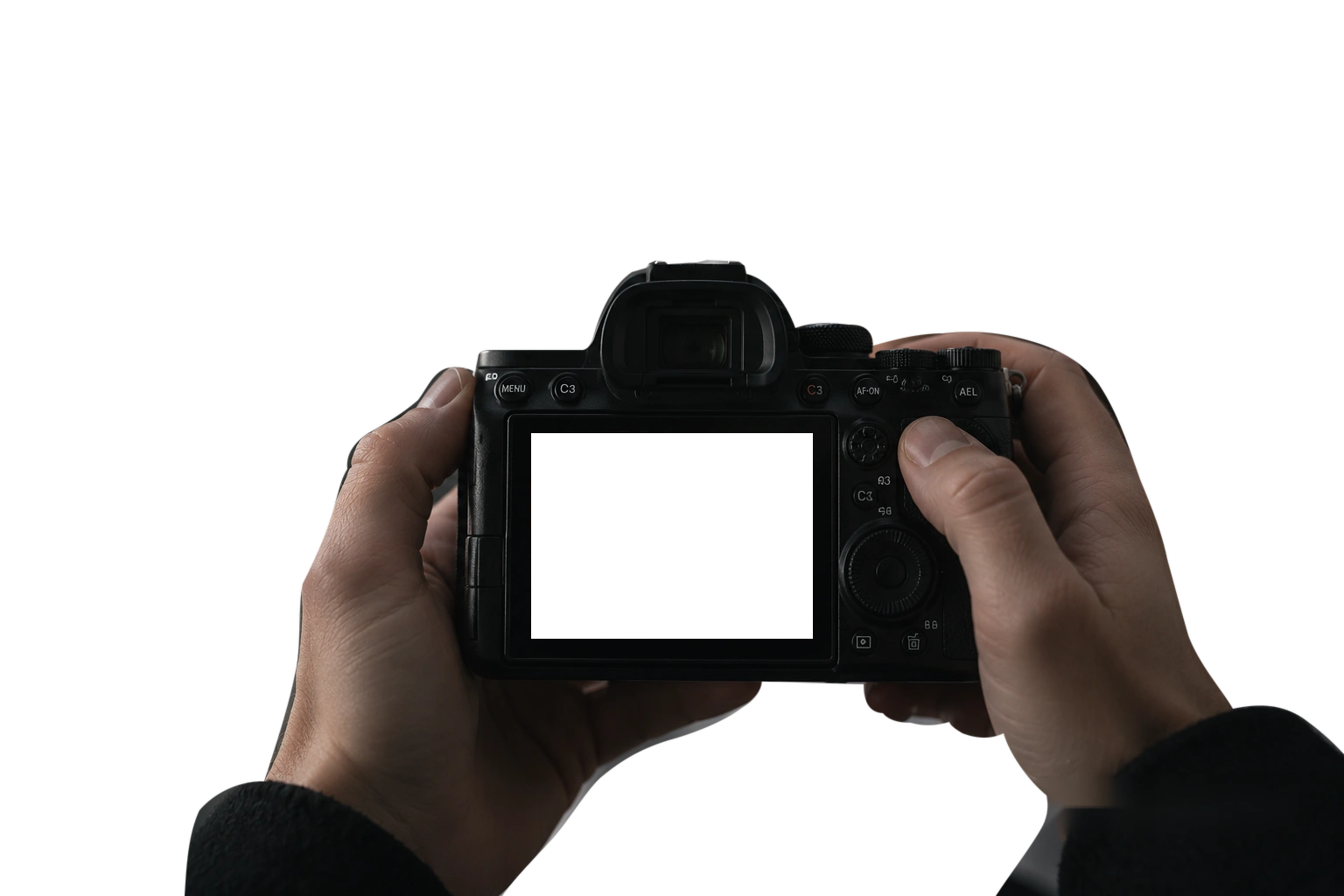 A photographic camera held in two hands, with a live smile preview on its screen.